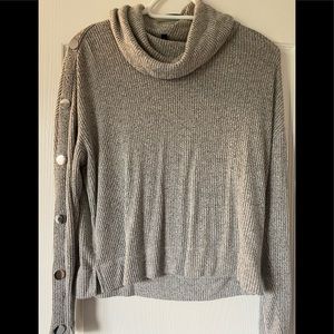 Turtleneck with button accents from Dynamite.